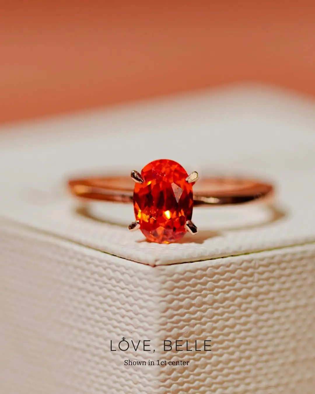 A ring with a coloured gemstone centre